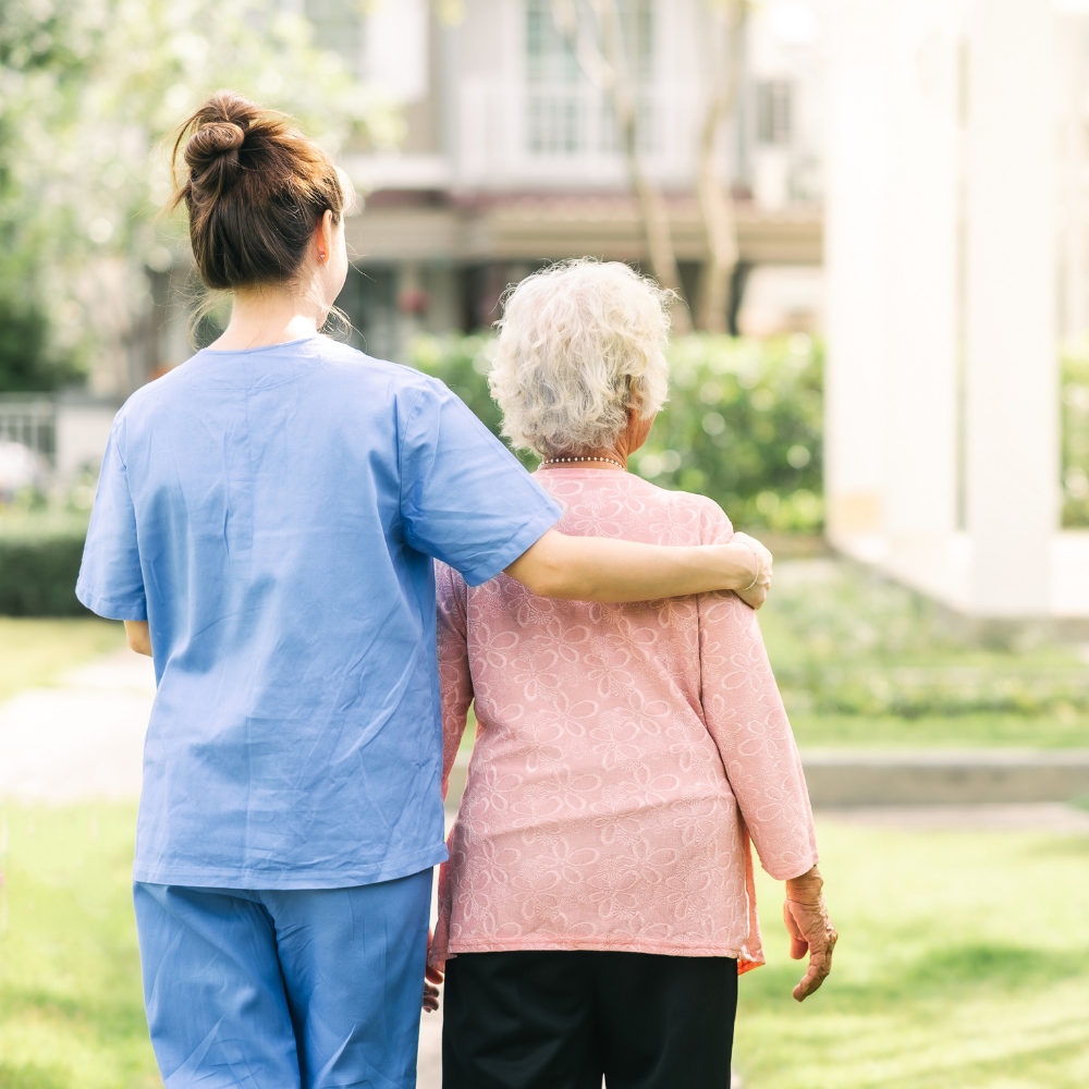 Support worker helping client with daily activities